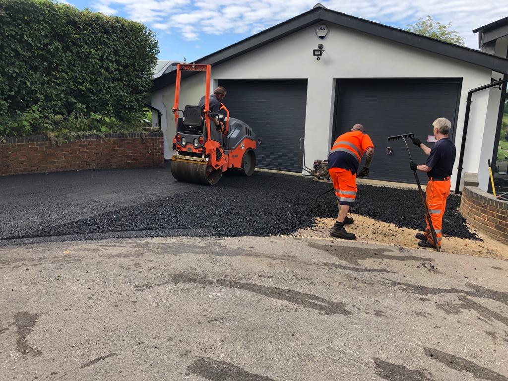 This is a photo of a bitumen driveway which is in the process of being installed by Springbrook Asphalt & Bitumen Surfacing
