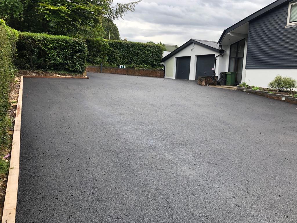 This is a photo of a asphalt driveway which is in the process of being installed by Springbrook Asphalt & Bitumen Surfacing